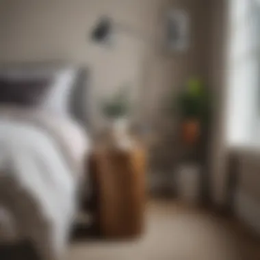 A cozy corner of a bedroom featuring a stylish stool and decorative elements.