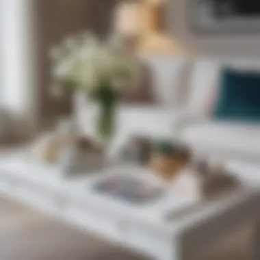 Decorative Arrangement on Coffee Table Elegant white wood coffee table adorned with decorative items and books